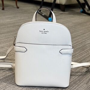 kate spade white saffiano mini backpack with gold logo